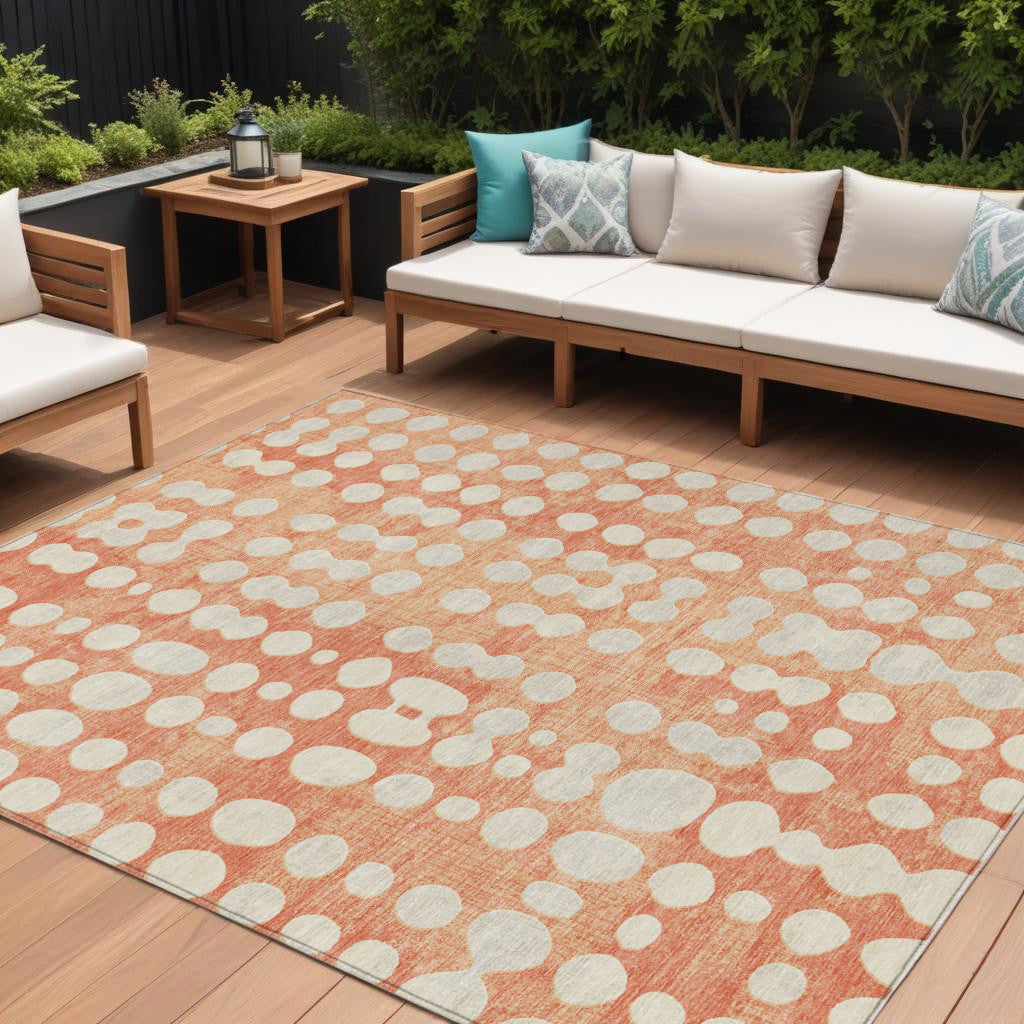10' X 14' Coral And Ivory Abstract Washable Indoor Outdoor Area Rug