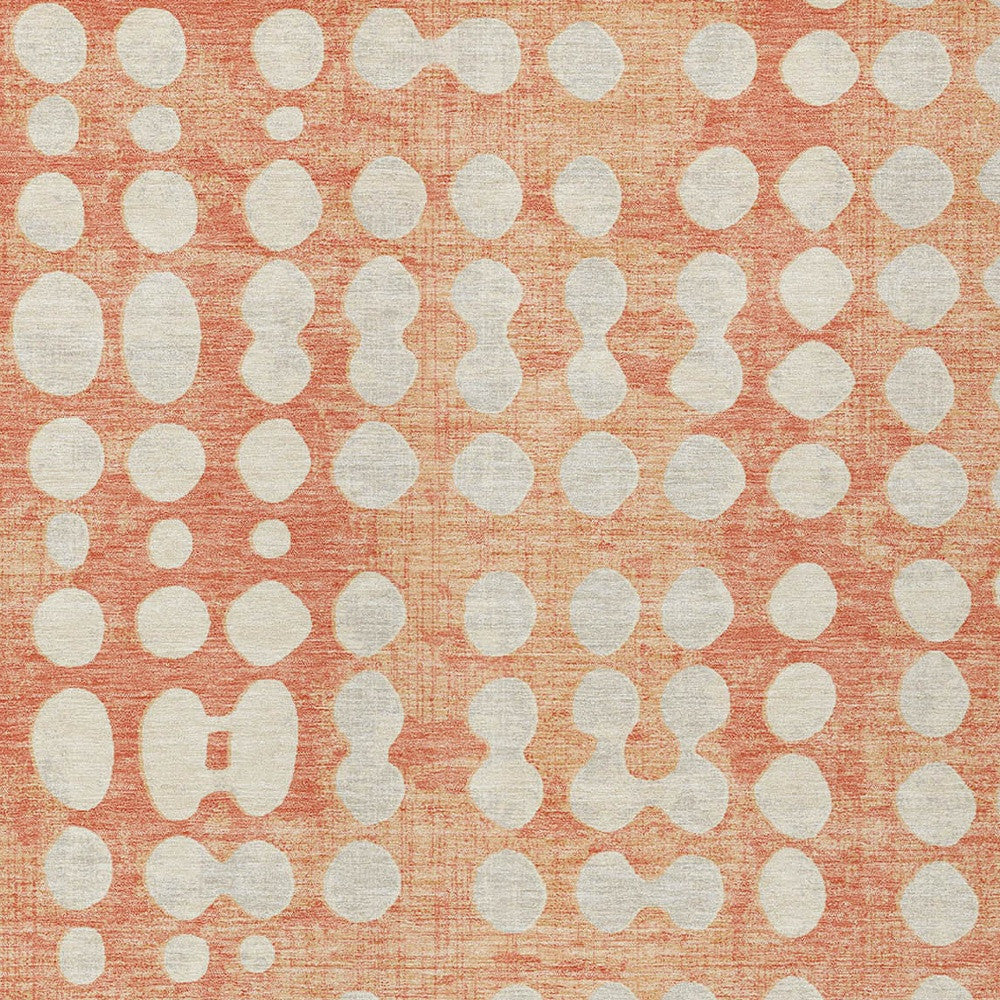10' X 14' Coral And Ivory Abstract Washable Indoor Outdoor Area Rug