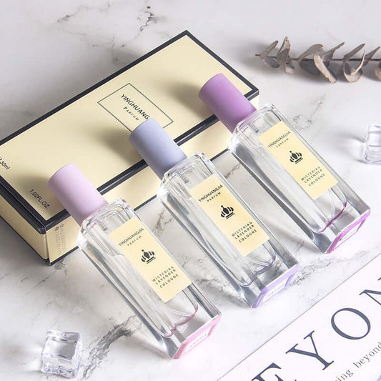 Three long-lasting light perfumes for women in elegant bottles, featuring wisteria, silver birch, and coriander scents.
