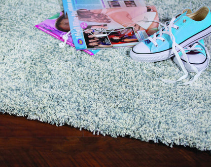 9' X 13' Slate Blue And Ivory Abstract Hand Woven Area Rug