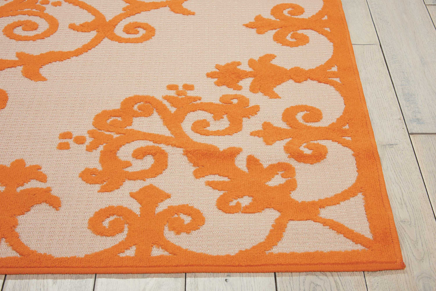 8' X 11' Orange And Ivory Damask Indoor Outdoor Area Rug
