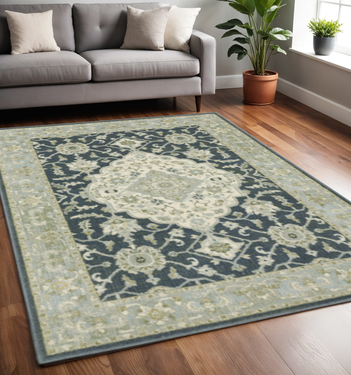 5' X 7' Teal Blue Ivory Green And Grey Oriental Power Loom Stain Resistant Area Rug