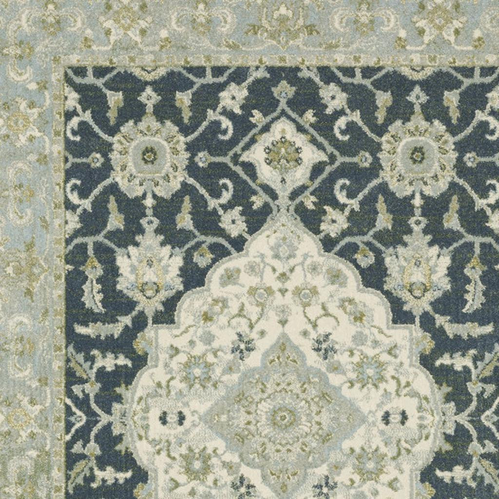 5' X 7' Teal Blue Ivory Green And Grey Oriental Power Loom Stain Resistant Area Rug