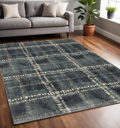 5' X 7' Blue And Ivory Geometric Power Loom Stain Resistant Area Rug