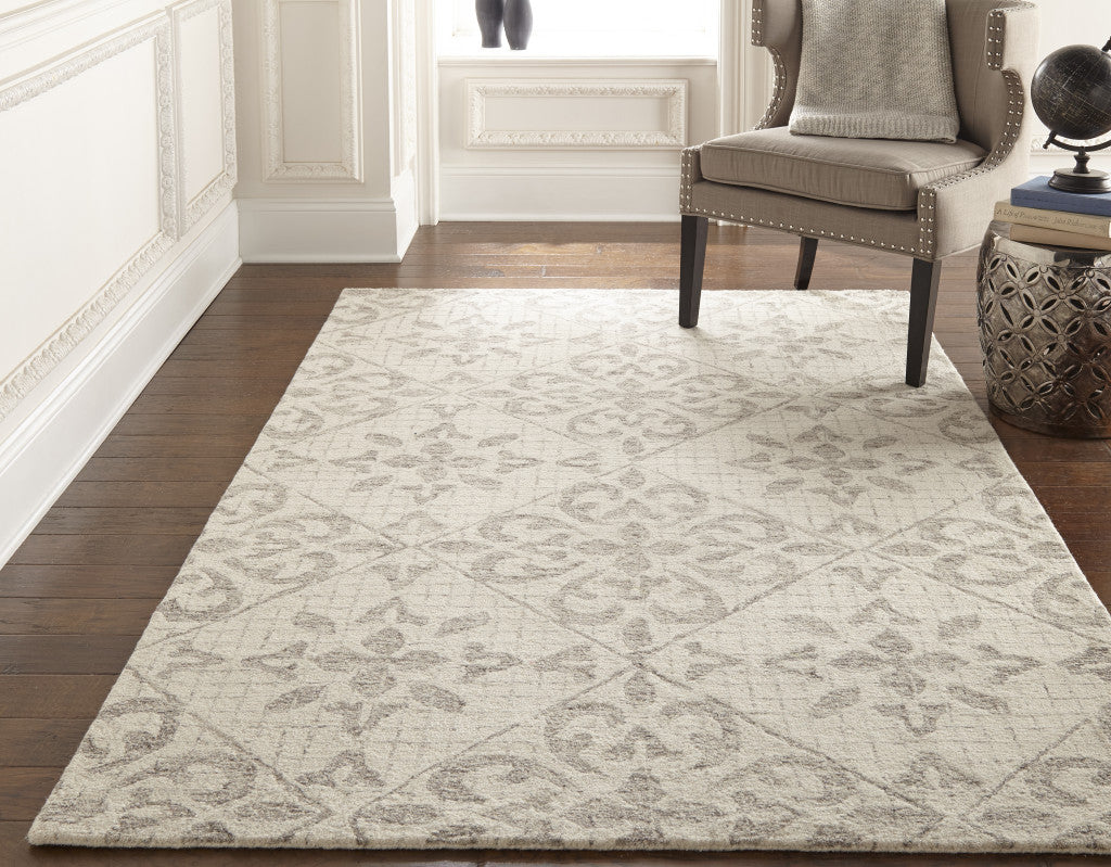 8' X 10' Ivory and Gray Wool Floral Hand Tufted Area Rug