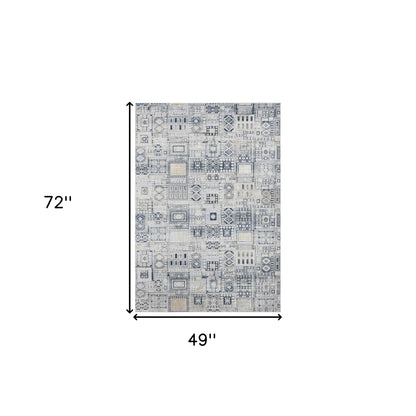 4' X 6' Ivory Black And Gold Ikat Area Rug