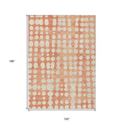 10' X 14' Coral And Ivory Abstract Washable Indoor Outdoor Area Rug