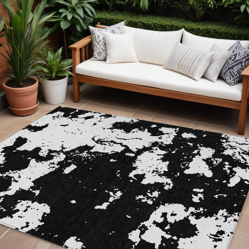 8' X 10' Black And Ivory Abstract Washable Indoor Outdoor Area Rug