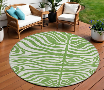 8' Green And Ivory Round Animal Print Washable Indoor Outdoor Area Rug